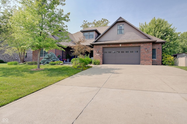 214 W Stoney Trl, Greenfield, IN 46140 - craftsman house featuring brick siding, concrete driveway, and a front lawn