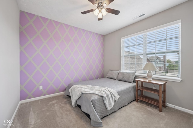 10806 Solis Cir, Fishers, IN 46038 - bedroom featuring carpet floors, wallpapered walls, and a ceiling fan