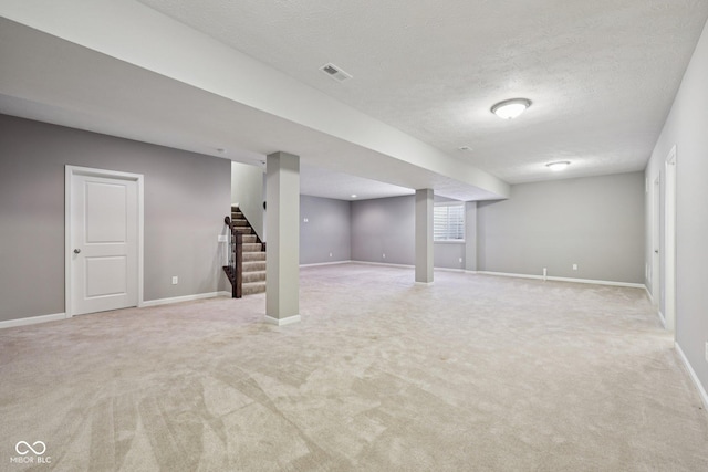 10806 Solis Cir, Fishers, IN 46038 - basement with stairs, light colored carpet, and a textured ceiling
