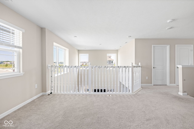 2892 Maricopa Blvd, Whitestown, IN 46075 - empty room featuring carpet floors and a smoke detector