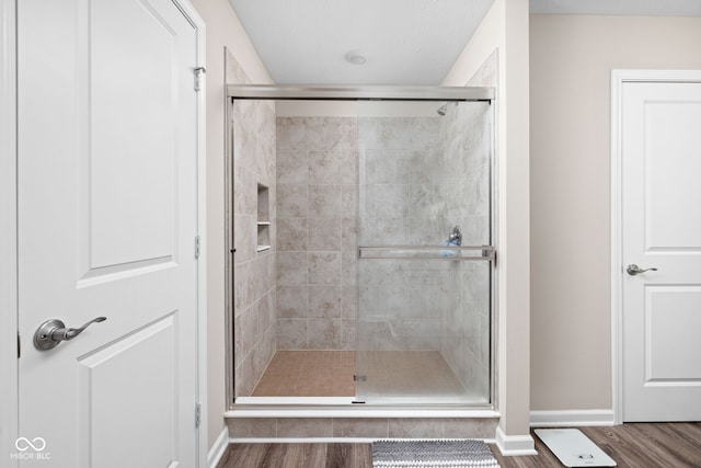2892 Maricopa Blvd, Whitestown, IN 46075 - bathroom with wood finished floors and a shower stall