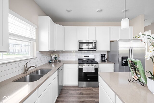 2892 Maricopa Blvd, Whitestown, IN 46075 - kitchen featuring stainless steel appliances, light countertops, white cabinets, and tasteful backsplash