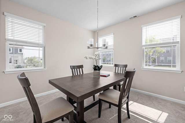 2892 Maricopa Blvd, Whitestown, IN 46075 - dining room featuring a chandelier and carpet flooring