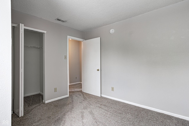 8030 Cork Bend Ln, Indianapolis, IN 46239 - unfurnished bedroom featuring carpet flooring, a textured ceiling, baseboards, and a closet