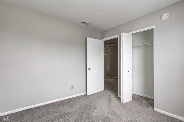 8030 Cork Bend Ln, Indianapolis, IN 46239 - unfurnished bedroom featuring carpet, a closet, and baseboards