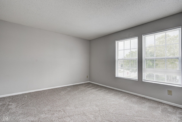 8030 Cork Bend Ln, Indianapolis, IN 46239 - spare room with carpet floors, baseboards, and a textured ceiling