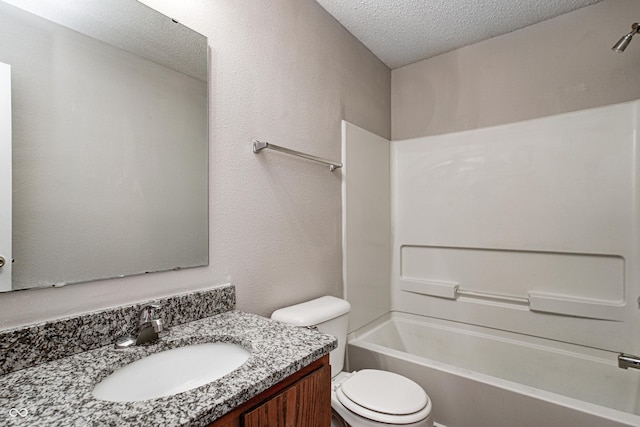 8030 Cork Bend Ln, Indianapolis, IN 46239 - full bathroom featuring a textured ceiling, toilet, vanity, and bathing tub / shower combination