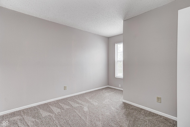 8030 Cork Bend Ln, Indianapolis, IN 46239 - carpeted empty room featuring a textured ceiling and baseboards