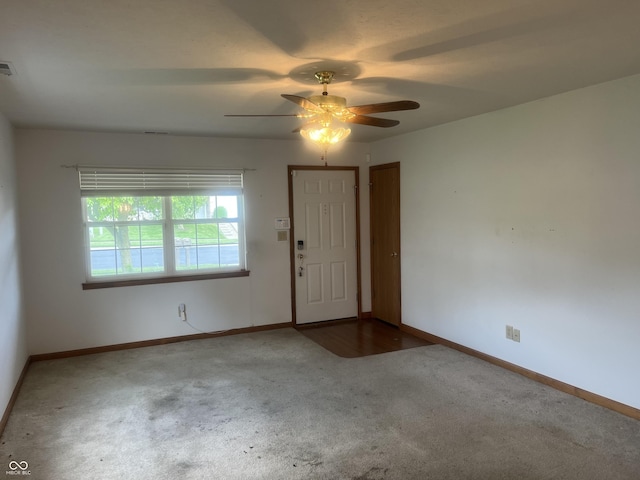 5632 Spring Mist Cir, Indianapolis, IN 46237 - carpeted entryway with ceiling fan and baseboards