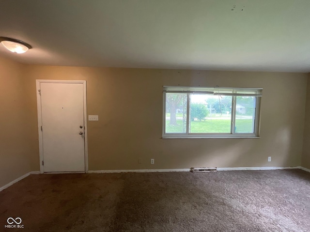 1749 N Graham Ave, Indianapolis, IN 46218 - unfurnished room with carpet and baseboards