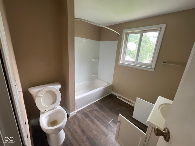 1749 N Graham Ave, Indianapolis, IN 46218 - full bath with vanity, bathing tub / shower combination, and wood finished floors