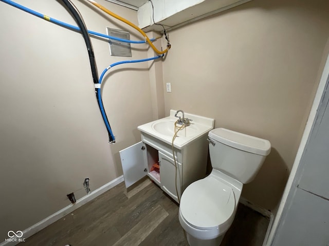 1749 N Graham Ave, Indianapolis, IN 46218 - bathroom featuring wood finished floors and vanity