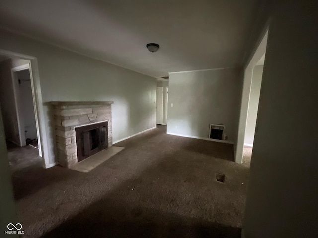 9045 Stardust Dr, Indianapolis, IN 46229 - unfurnished living room featuring a fireplace and carpet