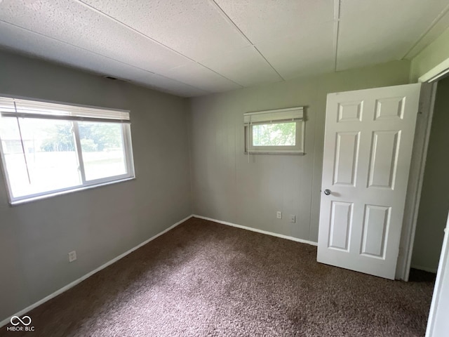 9045 Stardust Dr, Indianapolis, IN 46229 - unfurnished bedroom with carpet and baseboards
