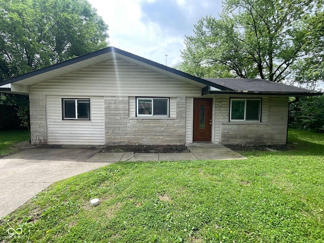 9045 Stardust Dr, Indianapolis, IN 46229 - single story home with stone siding and a front yard