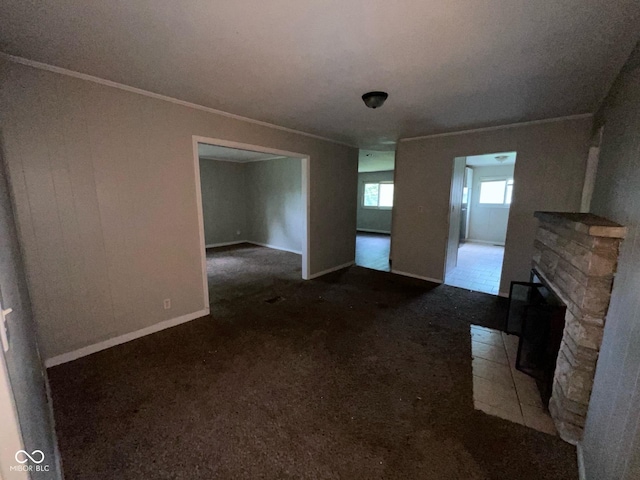 9045 Stardust Dr, Indianapolis, IN 46229 - unfurnished living room with ornamental molding and carpet floors