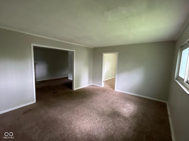 9045 Stardust Dr, Indianapolis, IN 46229 - empty room with carpet floors and baseboards