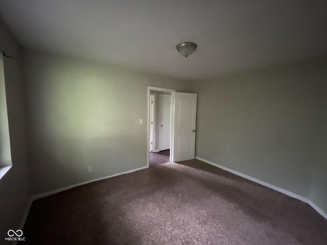 9045 Stardust Dr, Indianapolis, IN 46229 - unfurnished room featuring baseboards and carpet