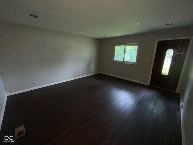 9045 Stardust Dr, Indianapolis, IN 46229 - entryway featuring dark wood-style flooring and recessed lighting