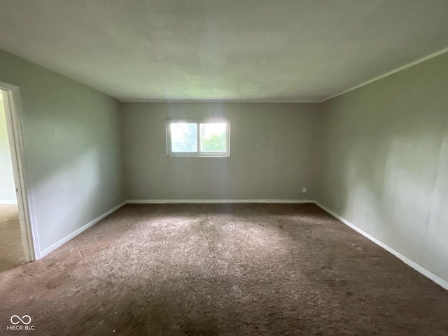 9045 Stardust Dr, Indianapolis, IN 46229 - empty room featuring carpet floors and baseboards