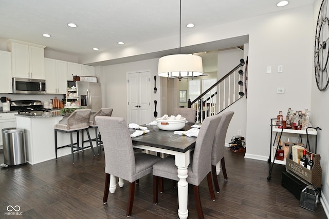13616 Whitten Dr N, Fishers, IN 46037 - dining space featuring recessed lighting, dark wood-type flooring, and stairway