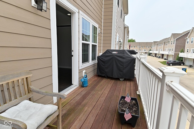 13616 Whitten Dr N, Fishers, IN 46037 - wooden deck featuring area for grilling and a residential view