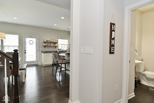 13616 Whitten Dr N, Fishers, IN 46037 - corridor with dark wood-type flooring, recessed lighting, and stairway