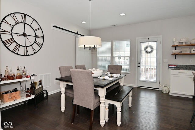 13616 Whitten Dr N, Fishers, IN 46037 - dining area with a barn door, dark wood finished floors, and recessed lighting