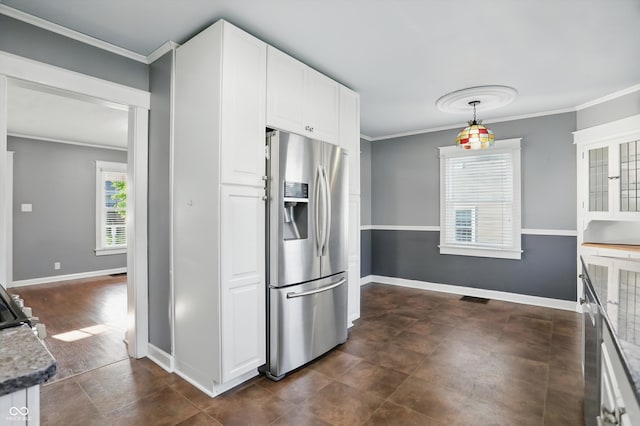 808 N Layman Ave, Indianapolis, IN 46219 - kitchen featuring stainless steel fridge with ice dispenser, ornamental molding, white cabinets, and hanging light fixtures