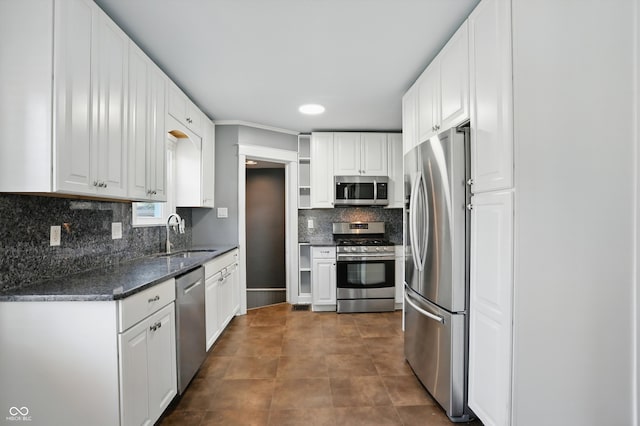 808 N Layman Ave, Indianapolis, IN 46219 - kitchen featuring stainless steel appliances, open shelves, white cabinets, tasteful backsplash, and recessed lighting