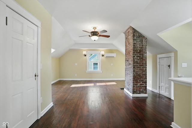808 N Layman Ave, Indianapolis, IN 46219 - additional living space with wood finished floors, a wall mounted air conditioner, a ceiling fan, and lofted ceiling