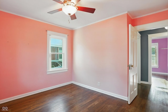 808 N Layman Ave, Indianapolis, IN 46219 - unfurnished room featuring dark wood-style floors, crown molding, and ceiling fan