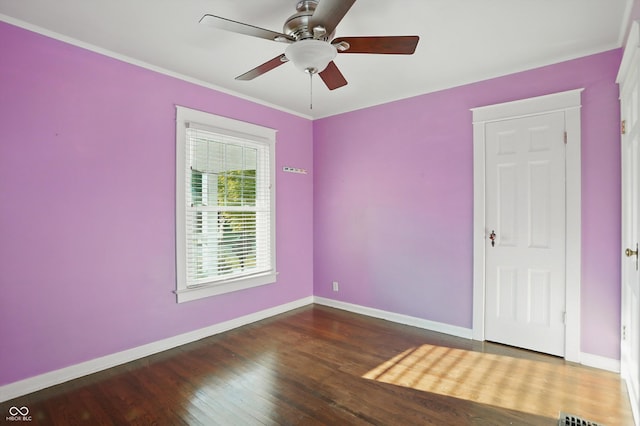 808 N Layman Ave, Indianapolis, IN 46219 - spare room with a ceiling fan, wood finished floors, and ornamental molding