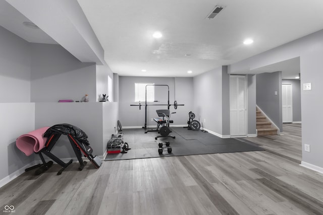 10312 Gladeview Dr, Indianapolis, IN 46239 - workout area with wood finished floors and recessed lighting