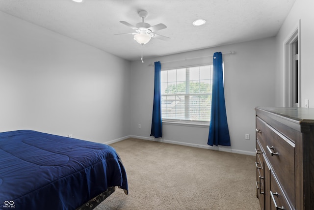 10312 Gladeview Dr, Indianapolis, IN 46239 - bedroom with light carpet and a ceiling fan