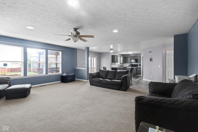 10312 Gladeview Dr, Indianapolis, IN 46239 - living room featuring carpet, a ceiling fan, a textured ceiling, and recessed lighting