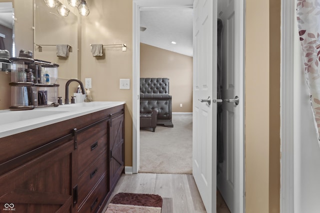 10312 Gladeview Dr, Indianapolis, IN 46239 - full bath featuring double vanity and wood finished floors