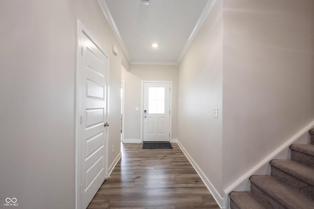 9671 Holborn Ave, Mccordsville, IN 46055 - entryway with crown molding, stairs, and dark wood-type flooring