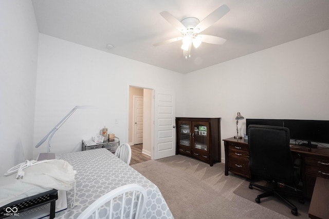9671 Holborn Ave, Mccordsville, IN 46055 - bedroom with a desk, light carpet, and a ceiling fan