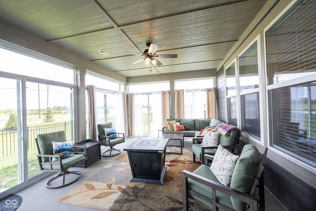 9671 Holborn Ave, Mccordsville, IN 46055 - sunroom featuring an outdoor living space with a fire pit and ceiling fan