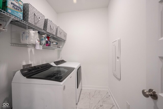 9671 Holborn Ave, Mccordsville, IN 46055 - washroom featuring washer and dryer, light marble finish floors, and electric panel