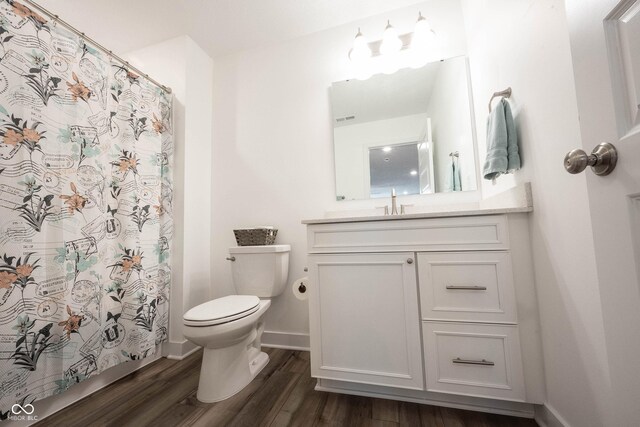 9671 Holborn Ave, Mccordsville, IN 46055 - full bath featuring wood finished floors, vanity, and a shower with shower curtain