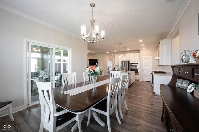 9671 Holborn Ave, Mccordsville, IN 46055 - dining area featuring crown molding, a chandelier, recessed lighting, and dark wood-style floors