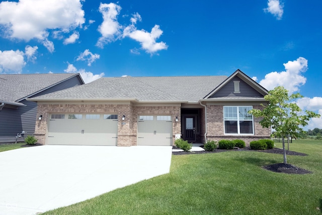 9671 Holborn Ave, Mccordsville, IN 46055 - view of front of home with brick siding, a garage, a front yard, driveway, and roof with shingles