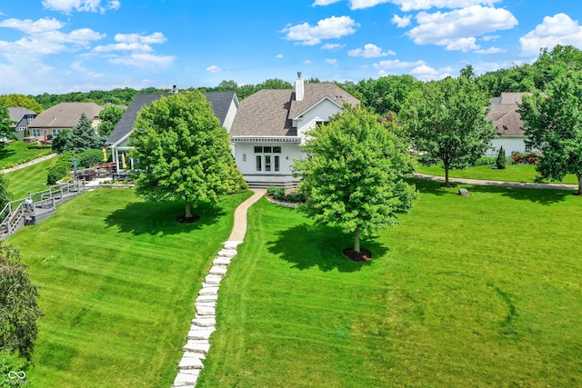 4810 Crystal River Ct, Indianapolis, IN 46240 - exterior space featuring a front yard and a chimney