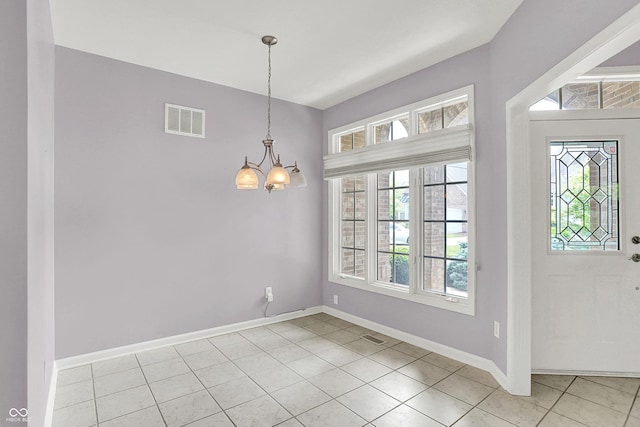 4810 Crystal River Ct, Indianapolis, IN 46240 - foyer featuring a chandelier, healthy amount of natural light, and light tile patterned flooring