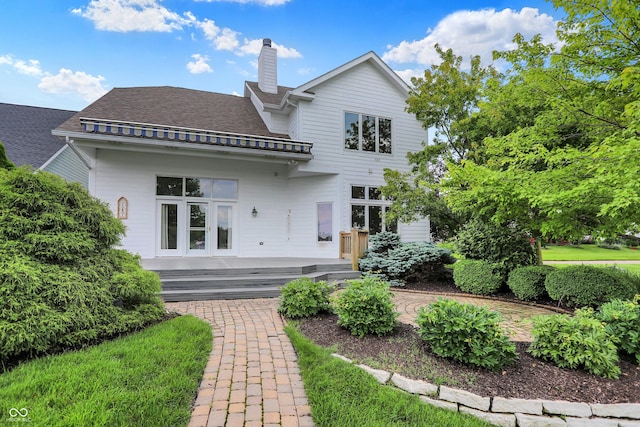4810 Crystal River Ct, Indianapolis, IN 46240 - back of property featuring a chimney, a deck, and roof with shingles