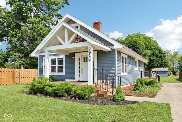 2928 Mounds Rd, Anderson, IN 46016 - bungalow-style house featuring a chimney