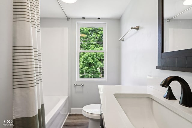 2928 Mounds Rd, Anderson, IN 46016 - bathroom featuring wood finished floors, shower / bath combo with shower curtain, and vanity