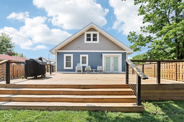 2928 Mounds Rd, Anderson, IN 46016 - rear view of house with french doors and a wooden deck